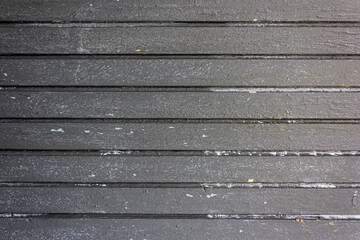 Vertical Texture of an old wooden Board with peeling gray paint. Full frame shot of gray painted wooden wall