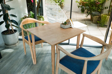 Empty Wooden Table and seat at restaurant,modern style.