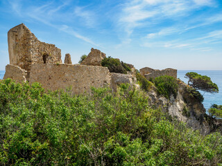 Fototapeta na wymiar Castle of Sant Esteve at sunny day. La Fosca beach, Catalonia, Spain.
