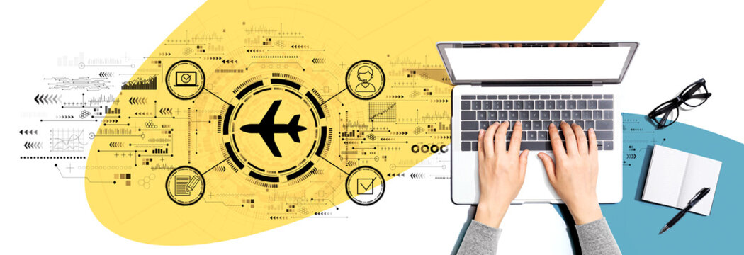 Flight ticket booking concept with person using a laptop computer