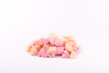 Delicious pink marshmallow isolated on white background. Sweets with strawberry flavor.