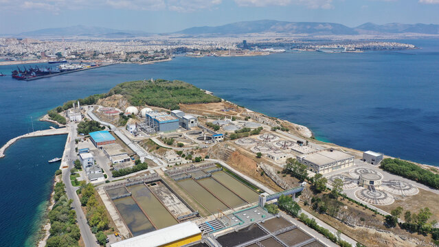 Aerial drone photo from island of Psitaleia the largest sewage treatment plant in Europe, Saronic gulf, Peiraeus, Attica, Greece