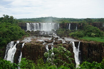 The photo shows a beautiful landscape at the Iguazu Falls, which are located on the border between Brazil and Argentina.