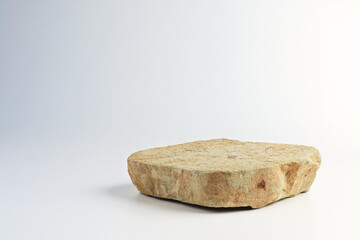 Background for cosmetic products. Stone podium. Front view.