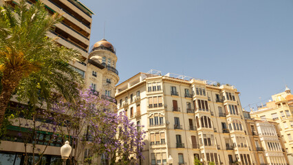 Fototapeta na wymiar Beautiful exteriors of buildings near the city centre on a bright sunny day.
