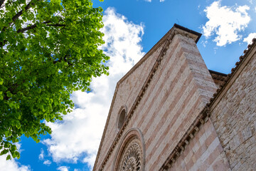 Perspective view of the St. Chiara church facade, in the old city centre of Assisi (Umbria Region,...