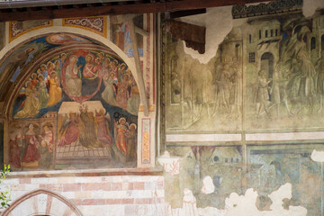 Medieval frescos in the city of Assisi (Umbria Region, central Italy). Ancient medieval city, is world famous as birthplace of St. Francis, Italy's christian Patron. - obrazy, fototapety, plakaty