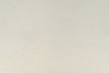 Texture of light beige decorative plaster, background.