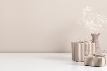 Gift box mockup on beige background.