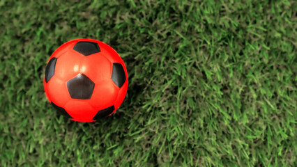 Red soccer ball. Selective focus.