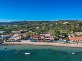 Fototapeta na wymiar Panoramic aerial view over Gialova seaside city in Navarino bay. It is one of the best touristic places located in Messenia, Greece