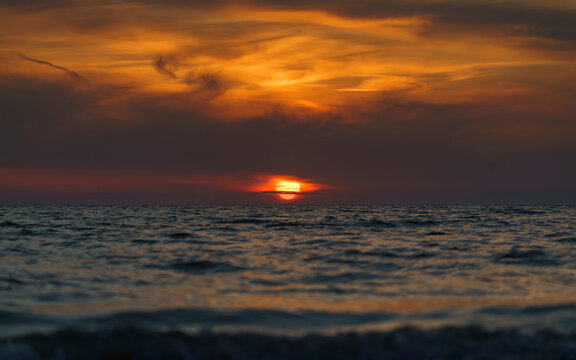sunset over the sea © Robert