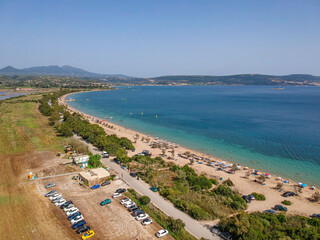 Fototapeta na wymiar Panoramic aerial view over Divari beach near Navarino bay, Gialova. It is one of the best beaches in mediterranean Europe. Beautiful lagoon near Voidokilia from a high point of view, Messinia, Greece