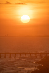 Beach sunset Panama City Beach, Florida with pier and people