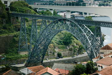 View of the Maria Pia railway bridge, commonly known as Ponte de Dona Maria Pia over the Portuguese northern municipalities of Porto and Vila Nova de Gaia.