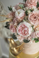 Beautiful box with hydrangeas and peonies. Soft pink roses and eucalyptus. Interior composition of flowers.