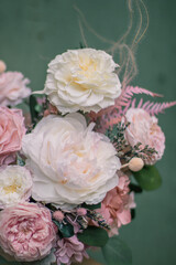 Beautiful spring flowers in box of tender peonies, roses. Preserved flowers for womens. Bouquet of flowers for a girl mother's day.