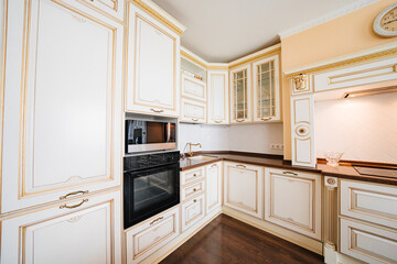 Fototapeta premium built-in home appliances. The interior of kitchen in a classic style. 