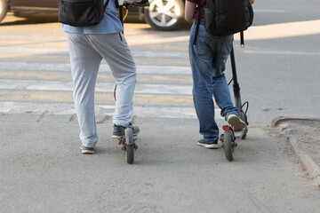 Scooter rental.Parking of scooters on the street of the city.