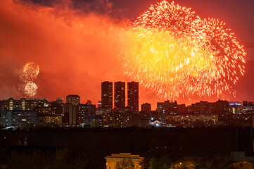 Fireworks over the city. Fireworks May 9 on Victory Day in Moscow. Moscow, Russia. May 9, 2022