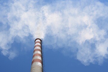 Chimney with smoke and carbon dioxide pollution
