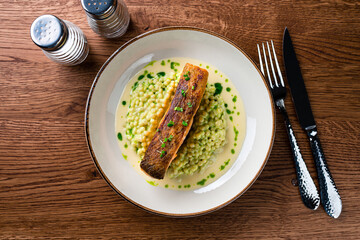 Cedar plank grilled or roasted salmon with herbs and spices