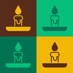 Pop art Burning candle in candlestick icon isolated on color background. Cylindrical candle stick with burning flame. Vector