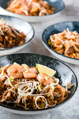 Asian noodles wok close-up, shallow dof