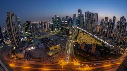 Panoramic skyline of Bay Avenue with modern towers residential development in Business Bay aerial...