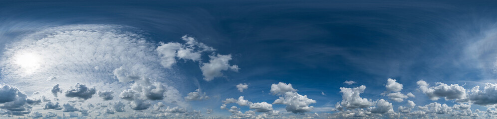 Seamless hdri panorama 360 degrees angle view blue overcast sky with beautiful fluffy cumulus...