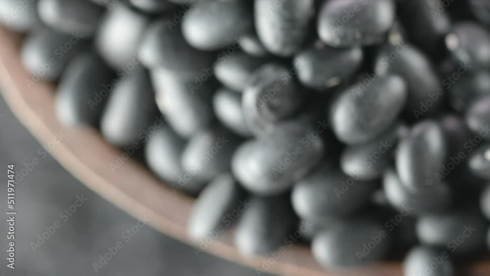 Canvas Prints Scooping Black Beans in Wooden Spoon