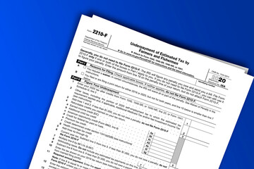Obraz premium Form 2210-F documentation published IRS USA 44501. American tax document on colored