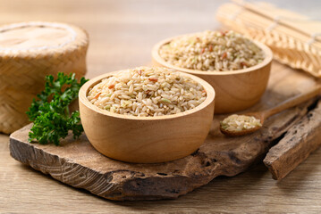 Organic Thai brown rice grain in bowl, Healthy food ingredients