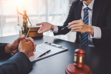 Businessman and lawyer discuss the contract document. Treaty of the law. Sign a contract business.