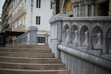Fototapeta na wymiar Stairs going up to the entrance of a French Cathedral in Biarritz