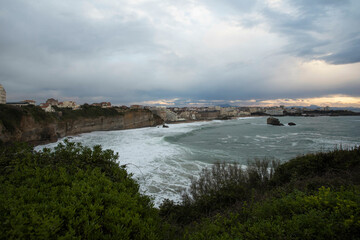 sunset in Biarritz, France over the ocean