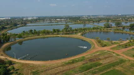 Fototapeta premium Aerial view from flying drone of Fish pond, fish farm 