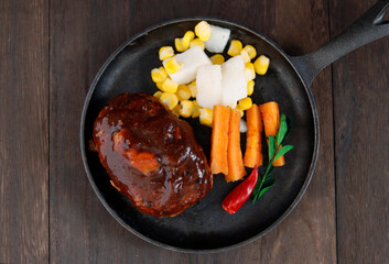 Hamburger and seasonings on the table