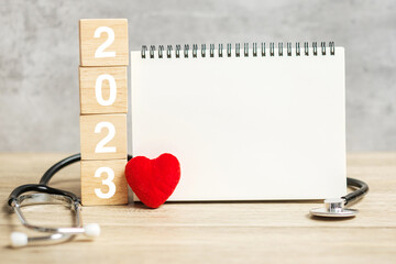 2023 Happy New Year for healthcare, Insurance, Wellness and medical concept. Stethoscope and blank...