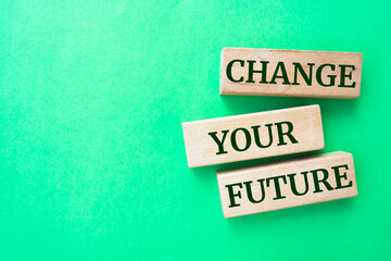 Wooden blocks with words 'Change your future'.