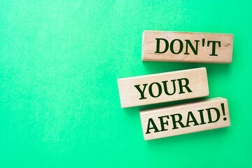 Wooden blocks with words 'Don't Be Afraid!'.