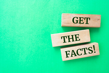 Wooden blocks with words 'Get the facts'.