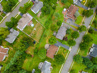 Aerial view of small american town residential houses roofs neighborhood in New Jersey USA