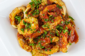 Fried Calamari with tomato sauce. 