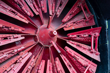 red snow plow wheel
