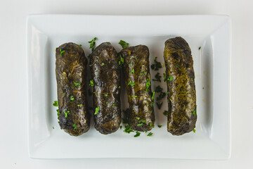 Grape leaves in a plate. 