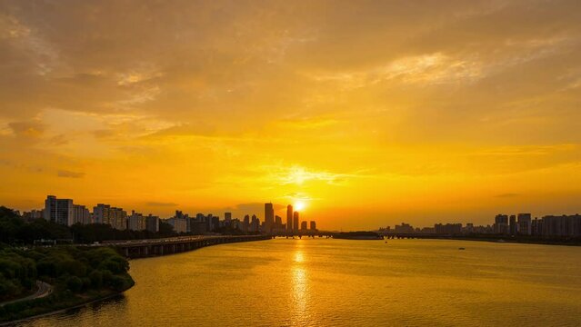 Timelapse 4K Beautiful view of Seoul Skyline and sunset.Traffic passing by.South Korea.