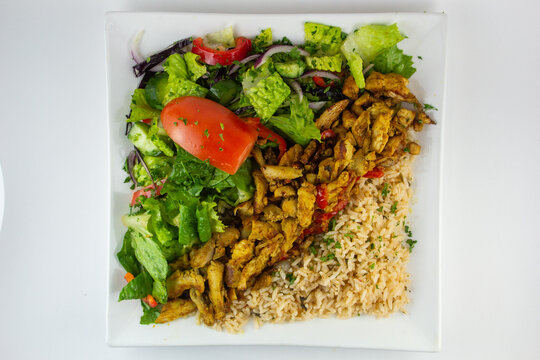 Chicken  Shawarma with rice and salad. 