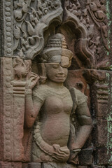 Fototapeta na wymiar A sandstone sculpture of Apsara at Ta Som Temple in Siem Reap Angkor Wat, Cambodia.