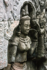 A sandstone sculpture of Apsara at Ta Som Temple in Siem Reap Angkor Wat, Cambodia.